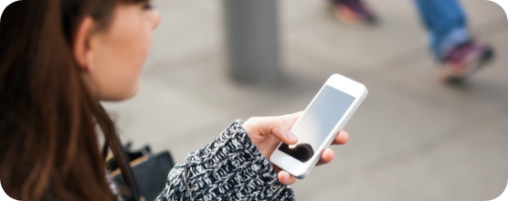 Woman Using Mobile App On Smartphone